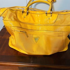 Beautiful large yellow travel bag duffel bag for any occasion, only used twice.